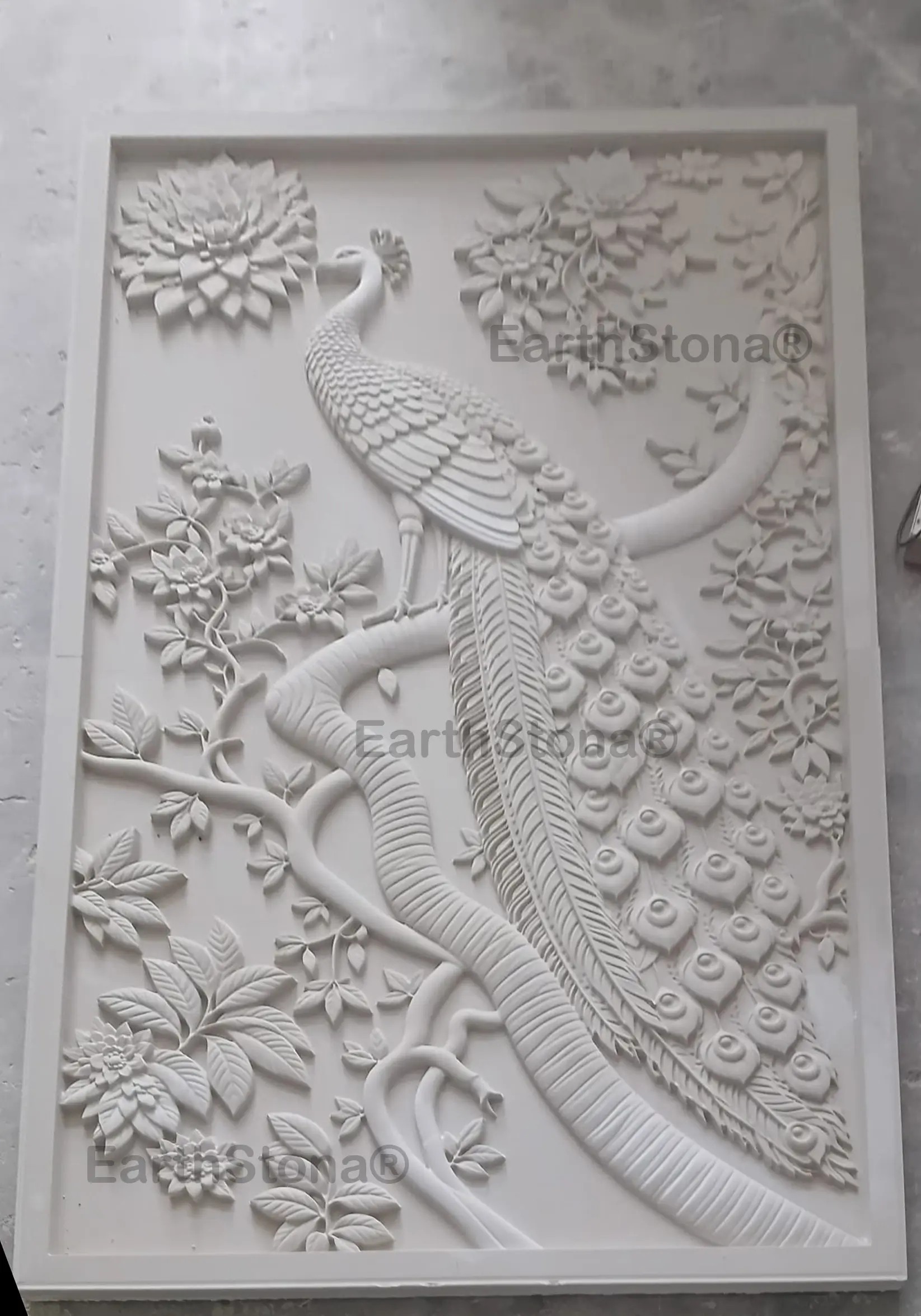 Royal peacock and floral 3D carved stone wall mural by EarthStona for a luxury interior